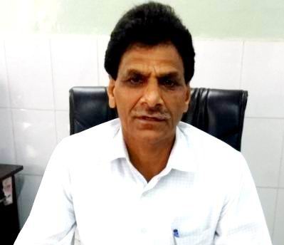 Dr. Maresh Kansra